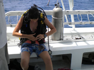 Sarina suiting up for her dive to Aquarius