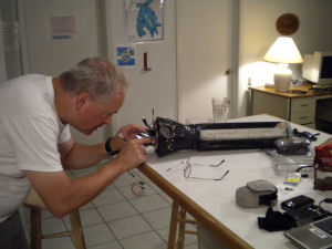 Mark installing the miniature video camera in Fetch1's nosecone