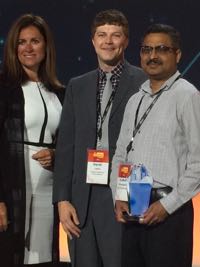 Dr. Derek Loftis of VIMS (C) on stage with Sridhar Katragadda (R; Systems Analyst for City of Virginia Beach) and Kim Majerus (L; Director of State and Local Government Partnerships at Amazon Web Services) during the ceremony announcing winners of the AWS Best Practices Award for 2017.