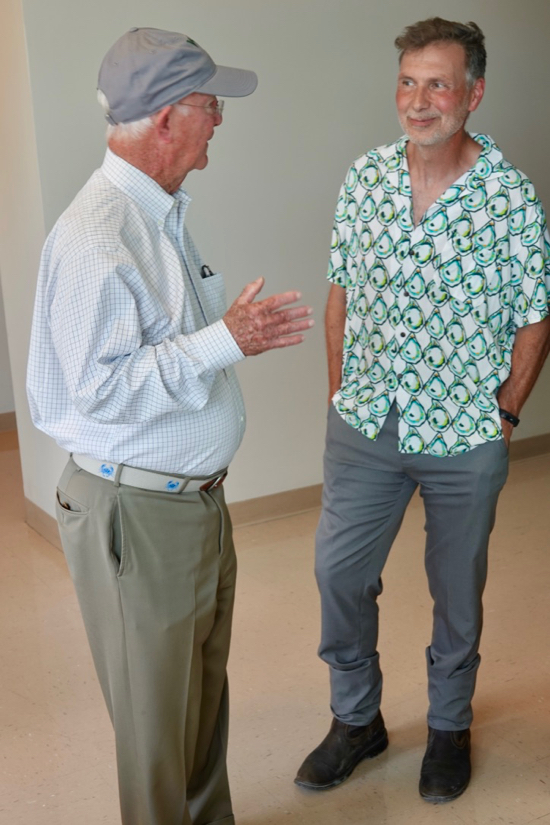 Marshall Acuff, Jr.  (L) discusses the features of the new Acuff Center for Aquaculture with Dr. Bill Walton, Acuff professor of marine science and Shellfish Aquaculture Program coordinator. © D. Malmquist/VIMS.