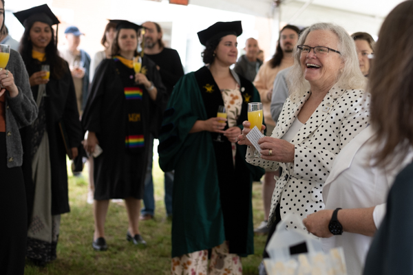 Associate Dean for Academic Studies Dr. Linda Schaffner (far right) toasts the class of 2023. Photo Credit: Miguel Montalvo