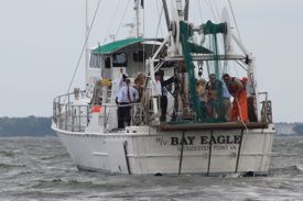 The Governor's party took to the Bay Eagle for a science tour of the York River.