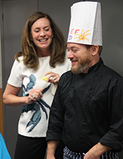 First Lady Dorothy McAuliffe decorated a chef's hat for Virginia Executive Mansion Chef Ed Gross.