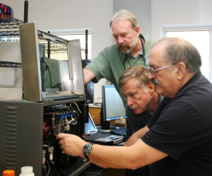 Steve Kaattari (R) with fellow VIMS researchers Mike Unger (L) and Wolfgang Vogelbein (C) in the lab at VIMS.