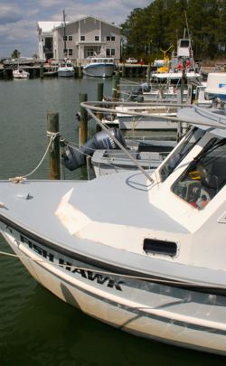 The  new RV Tidewater (background center) will replace the RV Fish Hawk.