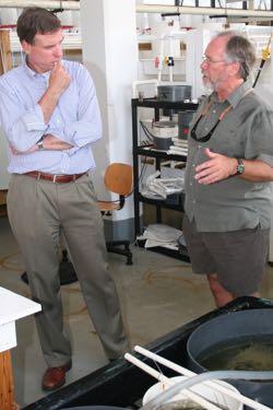 Virginia Senator Mark Warner with ABC director Stan Allen during a 2010 tour of the VIMS Oyster Hatchery.