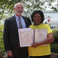 Dorothy Robinson (left) with VIMS Dean and Director Dr. John Wells (right).