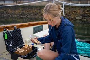 VIMS PhD student Savannah Mapes (pictured here), trained the Hōkūleʻa crew in Seattle in August 2023 to use a Planktoscope instrument for imaging plankton samples. She also joined the crew for the voyage from San Francisco to Ventura, California.