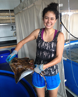 VIMS Ph.D. student Gail Schwieterman with a clearnose skate. © G. Schwieterman/VIMS