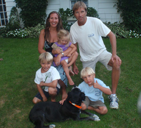 Carroll with his wife, fellow VIMS alum Laurie Carroll Sorabella (The Oyster Queen), at home with their children and dog, Shiny.