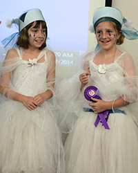 Raurie and Rhiannon Kilduff won the Grand Prize in the Marine Life Costume Contest for their bioluminescent sea angel costumes.