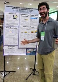 Danny Kaufman presents a research poster during an IMBER project meeting in Natal, Brazil in 2016.