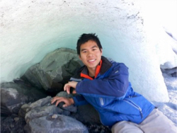 Quang Huynh explores an ice cave during one of his study trips.