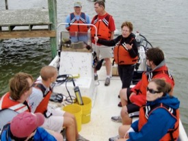 Anderson (C) explains the workings of a CTD to members of the 2008 matriculating class during the annual New Students field trip to VIMS' Eastern Shore Laboratory in Wachapreague.