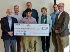 Varun Natarajan, a senior at Maggie L. Walker Governor’s School in Richmond, holds his 1st-place check. From L: VIMS Dean & Director John Wells, Natarjan's mentor Dickson Benesh,  David Weiss of CCRM, Executive Director of Clean Virginia Waterways Katie Register, David Stanhope of CCRM, and Virginia State Senator Monty Mason.