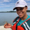 Thalia Wallace (Community College of Philadelphia) enjoys her first encounter with a blue crab. 