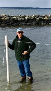 Hunter Walker conducts fieldwork in the Chesapeake Bay.