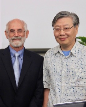 Research Professor Jian Shen (R) joins VIMS Dean and Director John Wells following the 2018 Awards Ceremony. © C. Katella.