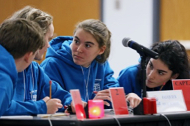 Members of the team from Fauquier High School in Warrenton brainstorm during the 2020 Blue Crab Bowl. © Aileen Devlin | Virginia Sea Grant.