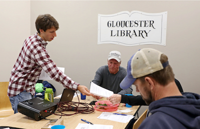 DelBene (L) hosts a 2018 focus group at the Gloucester Public Library to develop the survey with watermen, including J.C. Hudgins (C) and Dan Knott (R). © Aileen Devlin/Virginia Sea Grant.