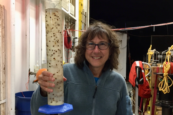 Dr. Steinberg prepares to process a sample of salps collected during the 2018 EXPORTS expedition to the northeastern Pacific. Each salp is about the size of a kiwi fruit. © K. Stamieszkin/Bigelow Laboratory.