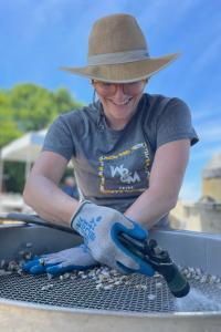 Jade Sevelow-Lee works on research on the habitat ecosystem services on oyster farms in pursuit of a masters degree.
