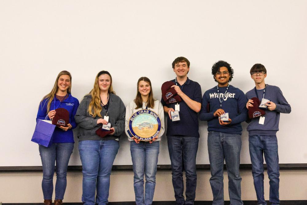 The 28th Blue Crab Bowl winners New Horizon's Governors School of Science and Technology poses with their trophy.