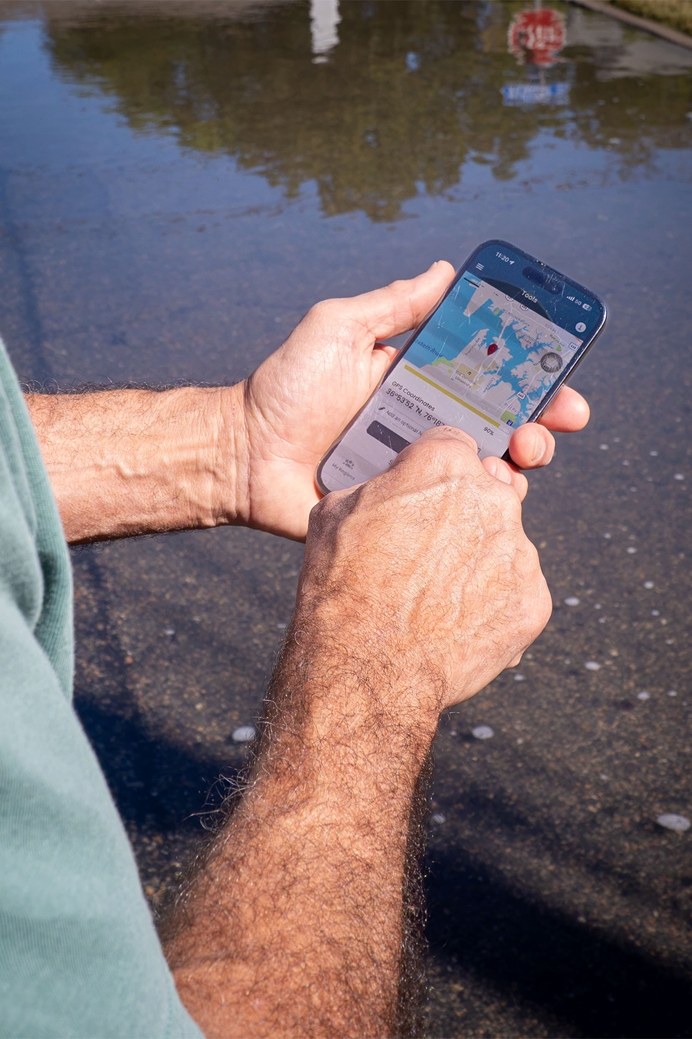 Volunteer observations are recorded in the Sea Level Rise app. Photo by Sue Mangan.