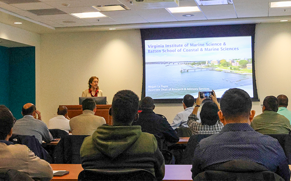 Megan La Peyre, associate dean of research & advisory services, instructing participants on the history and mission of the Batten School & VIMS. Photo by Candace Johnson.