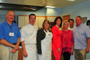 From L: Dr. Kirk Havens, Chef Ryan Manning, Virginia's First Lady Maureen McDonnell, former First Lady Susan Allen, Renee Smith, Executive Chef Peter Pahk, and waterman Ken Smith. Photo by Kathleen Scott.