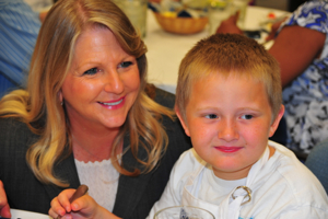 Virginia's First Lady Maureen McDonnell with second grader Collin Scarborough of Yorktown Elementary during the Healthy Bay for Healthy Kids event at VIMS. Photo by Kathleen Scott.