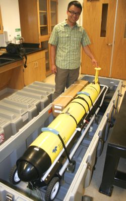 Asst. Professor Donglai Gong with his new Slocum glider.