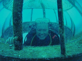 VIMS grad student and aquanaut Jo Gascoigne takes a breather during a 2002 mission to Aquarius.