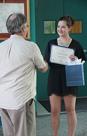 Dr. Stan Allen awards Lauren Pudvah her certificate of completion during the 2015 OAT reception.