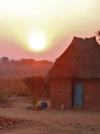 Sunrise over one of the many secondary houses on the compound of Blackburn's host family.