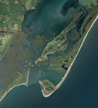 Satellite image of the Assateague-Chincoteague-Wallops barrier system, separated by Chincoteague Inlet.