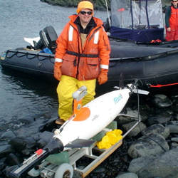 Mark Patterson with Fetch 1 in the South Shetland Islands.